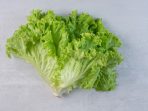 fresh-green-lettuce-marble-background-high-quality-photo_114579-27109