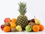 colorful-fruits-tasty-fresh-ripe-juicy-white-desk_179666-169