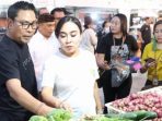 Wakil Walikota Denpasar, I Kadek Agus Arya Wibawa bersama Ny. Ayu Kristi Arya Wibawa.(Panennews.com/Agung Gede)